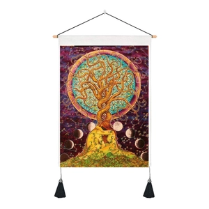 Detail of life tree wall tapestry with wooden rod, black tassels and sacred geometry