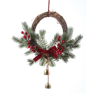 Christmas rattan wreath with red berries, pine cones and golden bells for door decoration