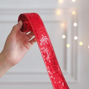 Sparkling red sequin ribbon for Christmas gift wrapping and festive DIY crafts decor