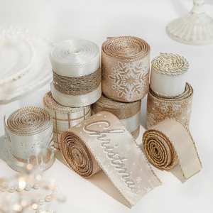 Champagne Christmas ribbons set with gold snowflakes and Merry Christmas lettering