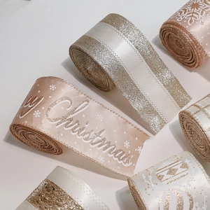 Champagne Christmas ribbon set with Merry Christmas text and snowflake patterns