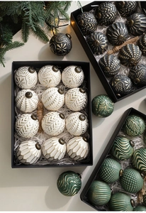 Detail showing vintage 8cm Christmas balls with gold embossing in a black gift box