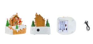 Detail view of resin Christmas gingerbread house with DC port and battery compartment