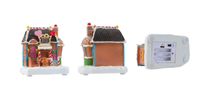 Macro view showing the candy shop gingerbread house with bottom battery compartment and switch
