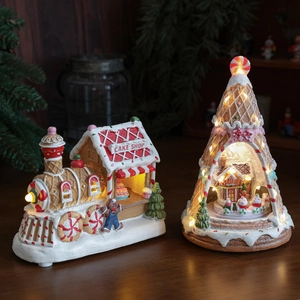 LED lighted gingerbread cake shop and train set with warm Christmas scene decoration