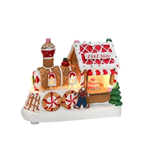 Rotating musical Christmas gingerbread train and cake shop house with LED lights