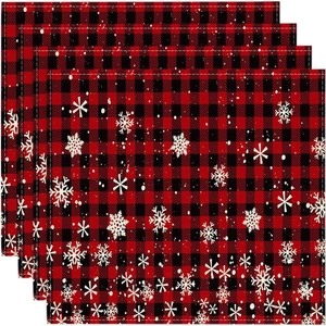 Set of 4 Christmas placemats with red and black buffalo plaid and white snowflake print