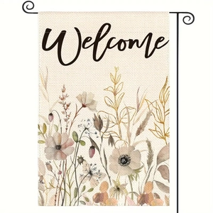 Detail of linen Welcome garden flag featuring floral poppy patterns and metal stand