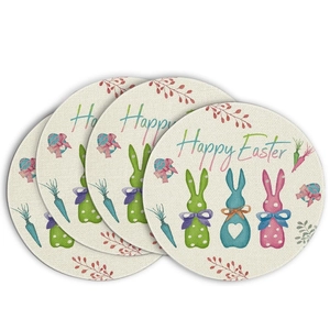 Detail of round linen placemats set featuring Happy Easter bunny prints and textures