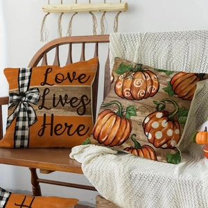 Detailed texture of Thanksgiving linen pillow covers with pumpkin and festive lettering