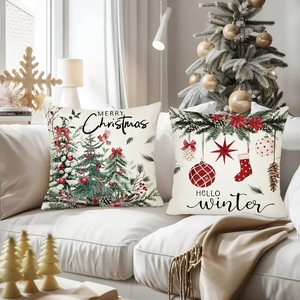 Detail of Christmas pillow covers featuring festive tree and ornament patterns for sofa decor