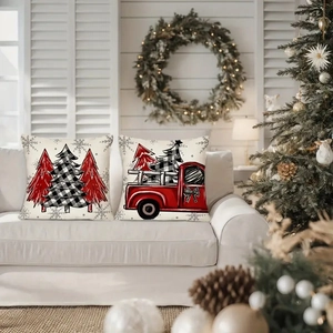 Christmas red truck and patterned trees pillow covers on sofa with festive decor