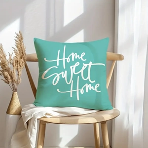 Set of 4 tropical plant throw pillows featuring Home Sweet Home quote on mint green fabric