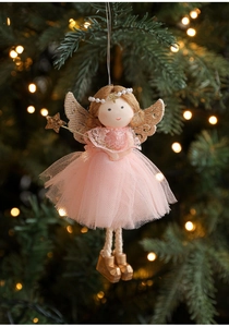 Detail of pink mesh angel doll with gold wings and star wand on Christmas tree decoration