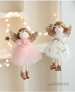 Detail of plush angel girl ornaments with mesh skirts and glittery wings for Christmas trees