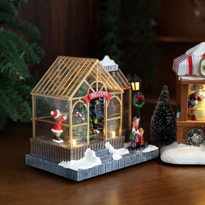 Lighted resin Christmas glass greenhouse with miniature snow scene and LED tree decoration