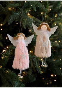 Detail of plush angel ornaments with glitter wings and silver bells on Christmas tree