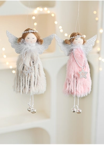 Detail of plush angel ornaments with faux feathers, silver wings and metal bells