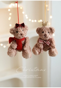 Detail of plush brown teddy bear ornaments with sequins and scarves for Christmas decor