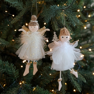 Christmas plush gauze angel doll ornaments with gold wings on a decorated tree