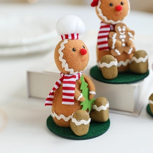 Set of two gingerbread man felt figurines with chef hats and scarves for Xmas decor