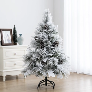 Lush snow-flocked Christmas tree with pine cones and sturdy black metal base stand