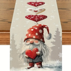 Detail of Christmas linen table runner featuring a cartoon gnome with red heart and snowflakes