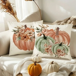 Set of two decorative autumn linen pillow covers with painted pumpkins and floral patterns