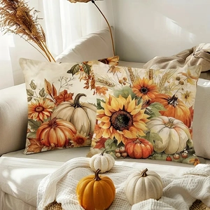 Autumn harvest pumpkin pillow covers with sunflowers and linens on a cozy sofa