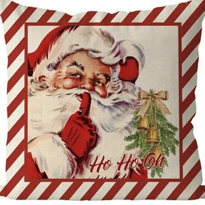 Dettaglio del copricuscino in lino Babbo Natale vintage con bordi a strisce rosse e bianche