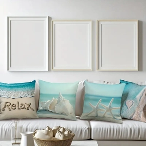 Set of 4 ocean theme pillow covers with starfish and seashell prints on a white sofa