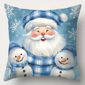 Detail of Christmas pillowcase with cartoon Santa, snowmen and blue snowflake patterns