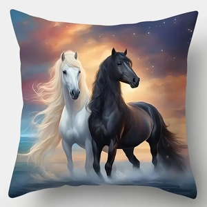 Modern horse sunset print cushion cover featuring black and white horses in scenery