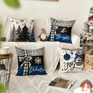 Cozy Christmas linen pillow covers set featuring snowman and tree on a white sofa decor