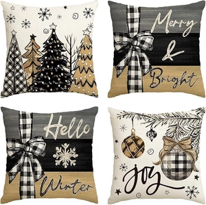 Detailed macro view of four linen Christmas pillow covers featuring winter holiday motifs