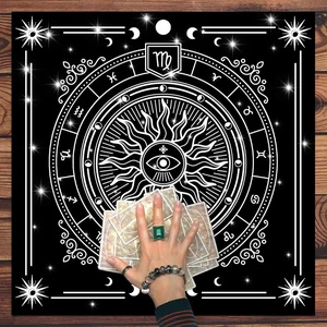 Tarot altar cloth featuring moon phases and zodiac symbols with celestial sun design