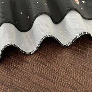 Detailed close-up of tarot tablecloth showing double-sided fabric with fine wavy edge stitching