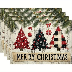 Detail showing set of four linen-textured Christmas placemats with festive tree patterns