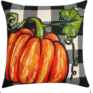 Housse de coussin citrouille orange avec motif vichy noir et blanc sur tissu lin