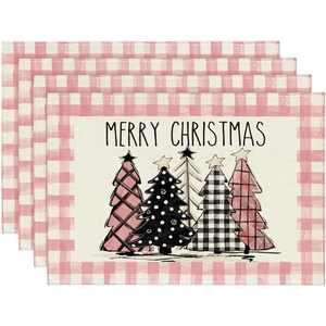 Set of four linen Christmas placemats with pink checkered borders and decorative trees