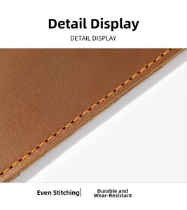 Detail view of durable stitching and premium leather texture on a brown waist bag holster
