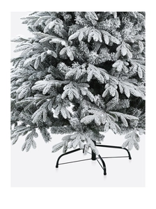 Dettaglio dell'albero di Natale floccato con aghi innevati e robusta base in metallo