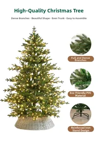 Detail of luxury PVC Christmas tree showing dense branches, LED lights, and iron stand