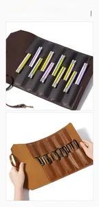 Detailed view of vintage leather roll pencil case with multi-slot storage and strap