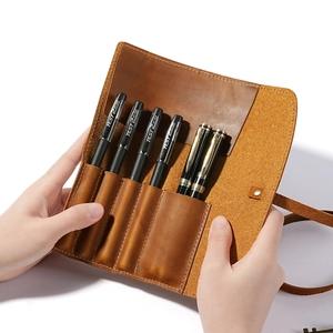 Handmade brown crazy horse leather roll pencil case with vintage tie closure and multiple slots