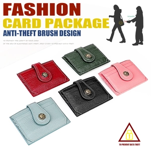 Detailed close-up of multi-color RFID leather card holders with floral metal snaps