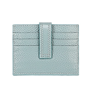 Close-up of light blue leather card holder with three card slots and white stitching