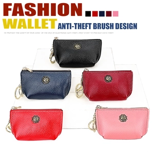 Detail of five-color leather wallets with gold rose emblem and secure anti-theft design