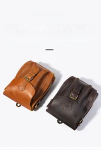 Macro view of vintage crazy horse cowhide leather bags in brown and coffee tones