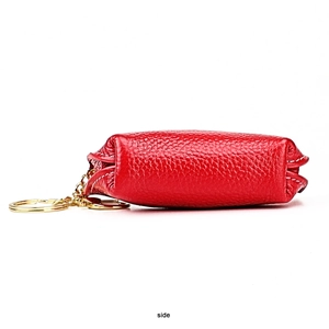 Side view of red pebble grain leather coin purse with golden metal key ring and chain